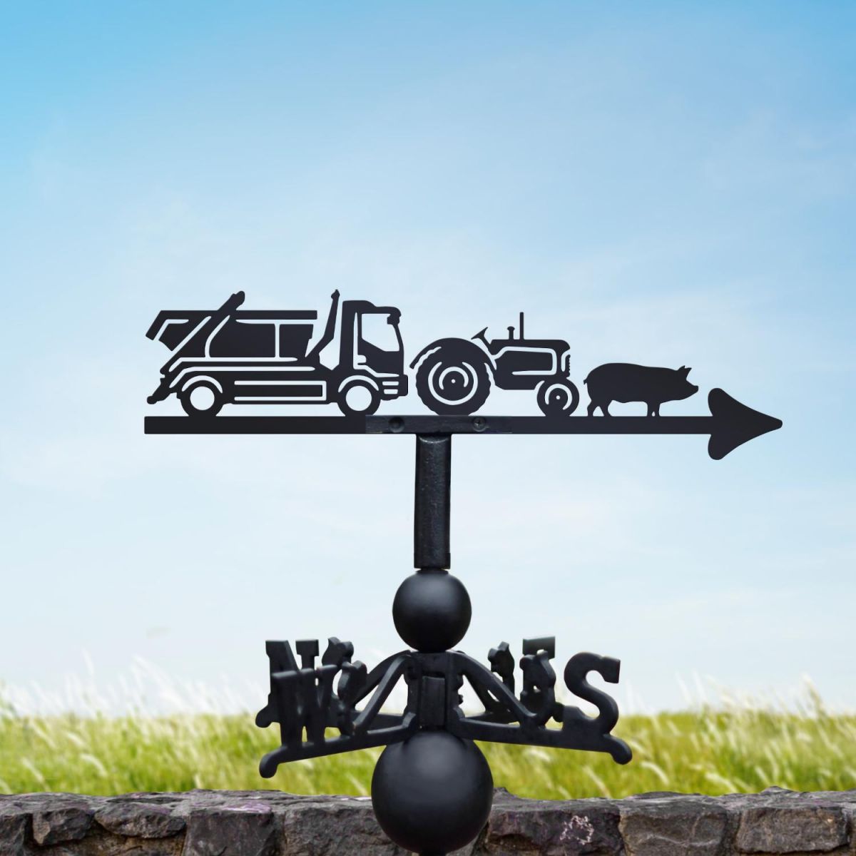 Tractor, Skip, Lorry & Pig Weathervane on a summers day