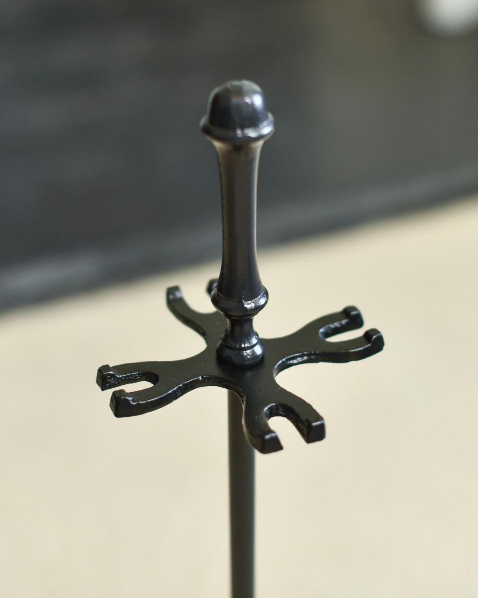 Close-Up of Freestanding Hooks for Fireside Tools Close-Up of Freestanding Hooks for Fireside Tools