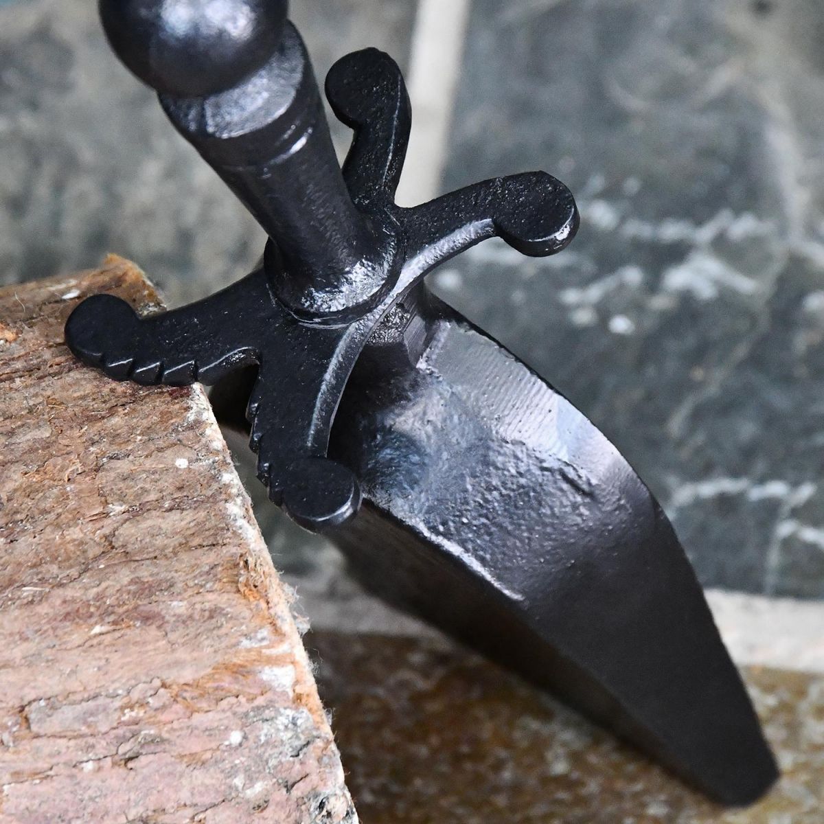 Close-up of the Black Finish on the Traditional Iron Pan & Brush Set