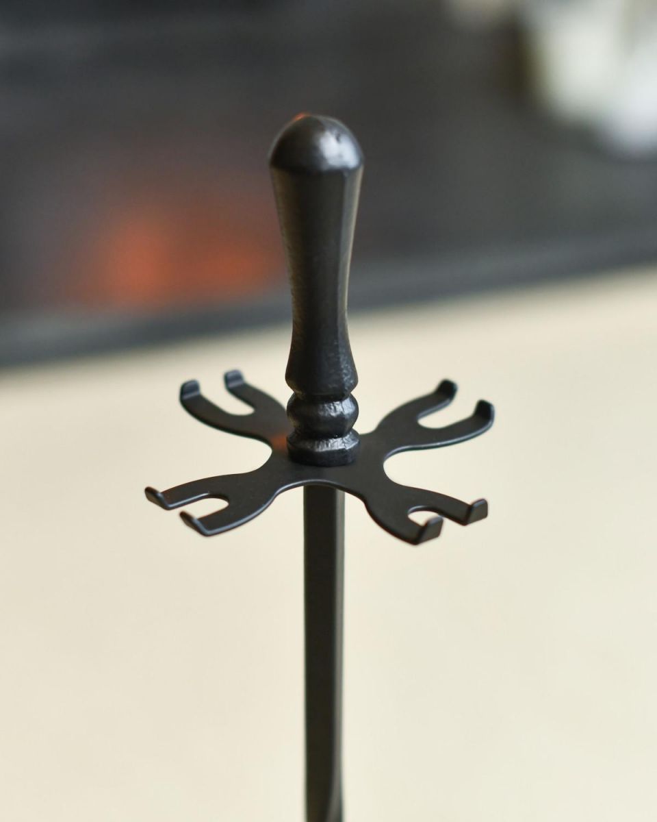 Close Up Of Traditional Black Single Twist Companion Set Stand