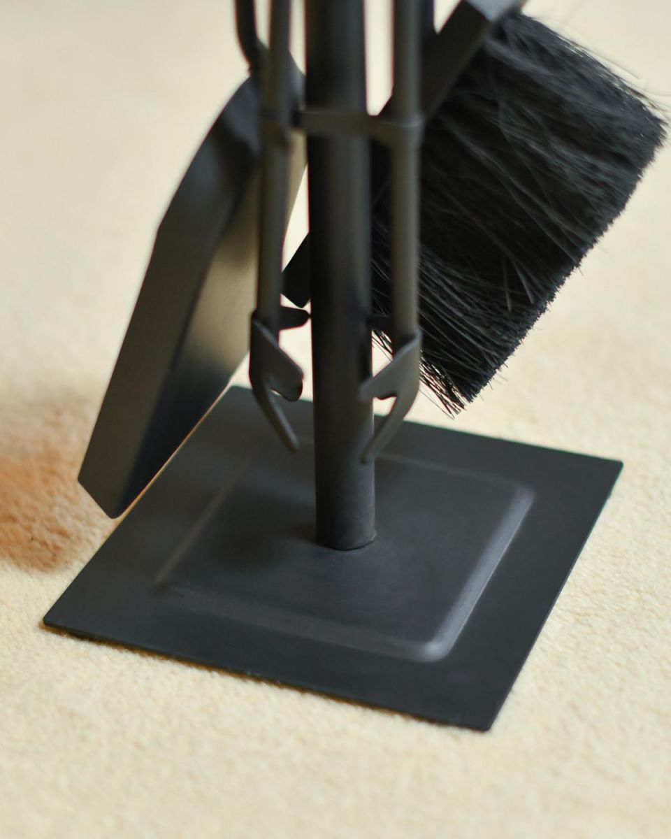 Close Up Of Traditional Black Slim Three Piece Companion Set Base