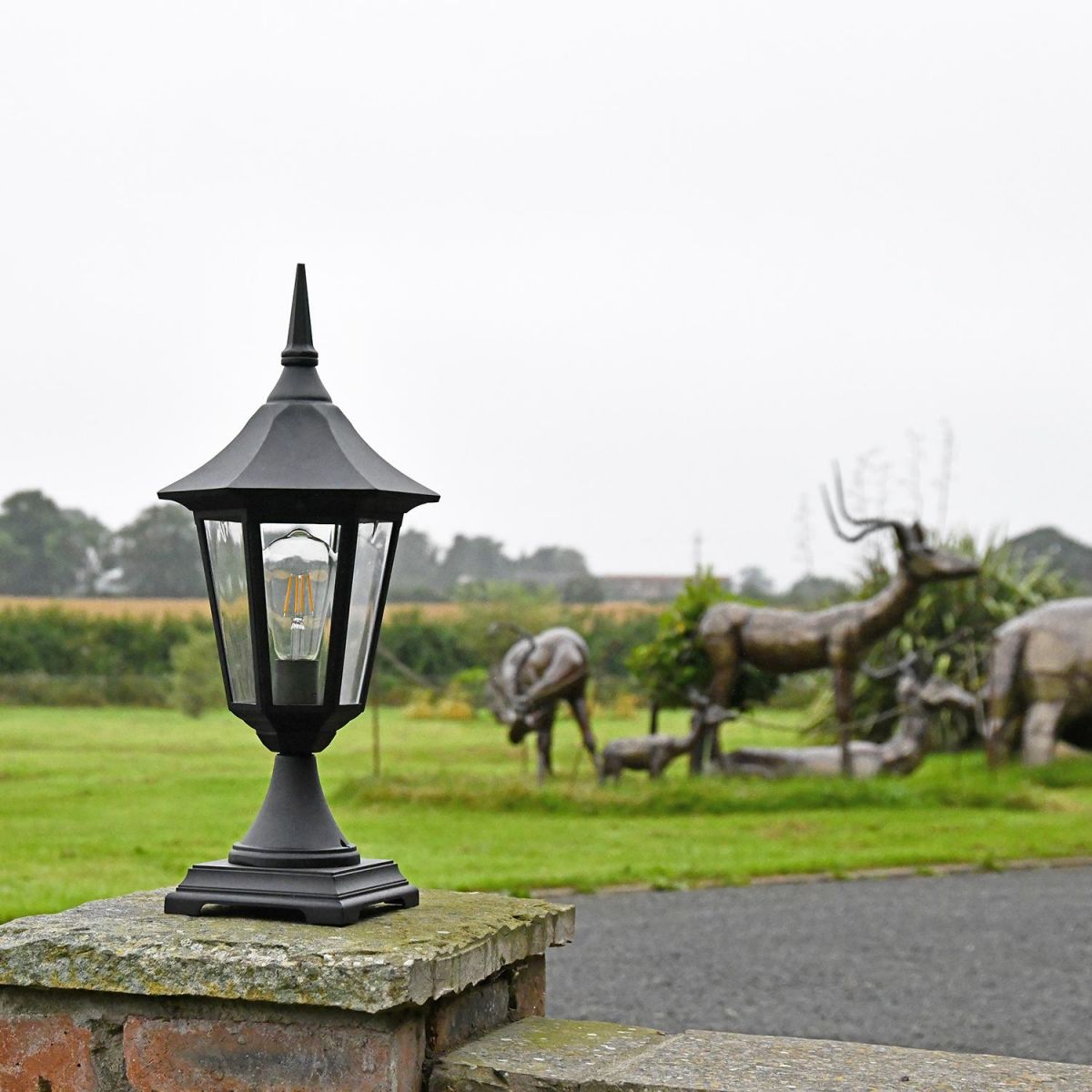 Traditional Black Tinted Pillar Light in Situ on a Driveway