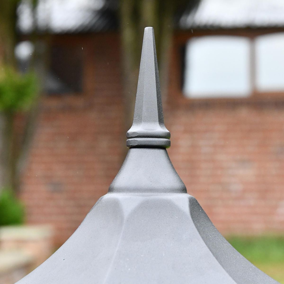 Spire Style Finial on the Top of the Pillar Light