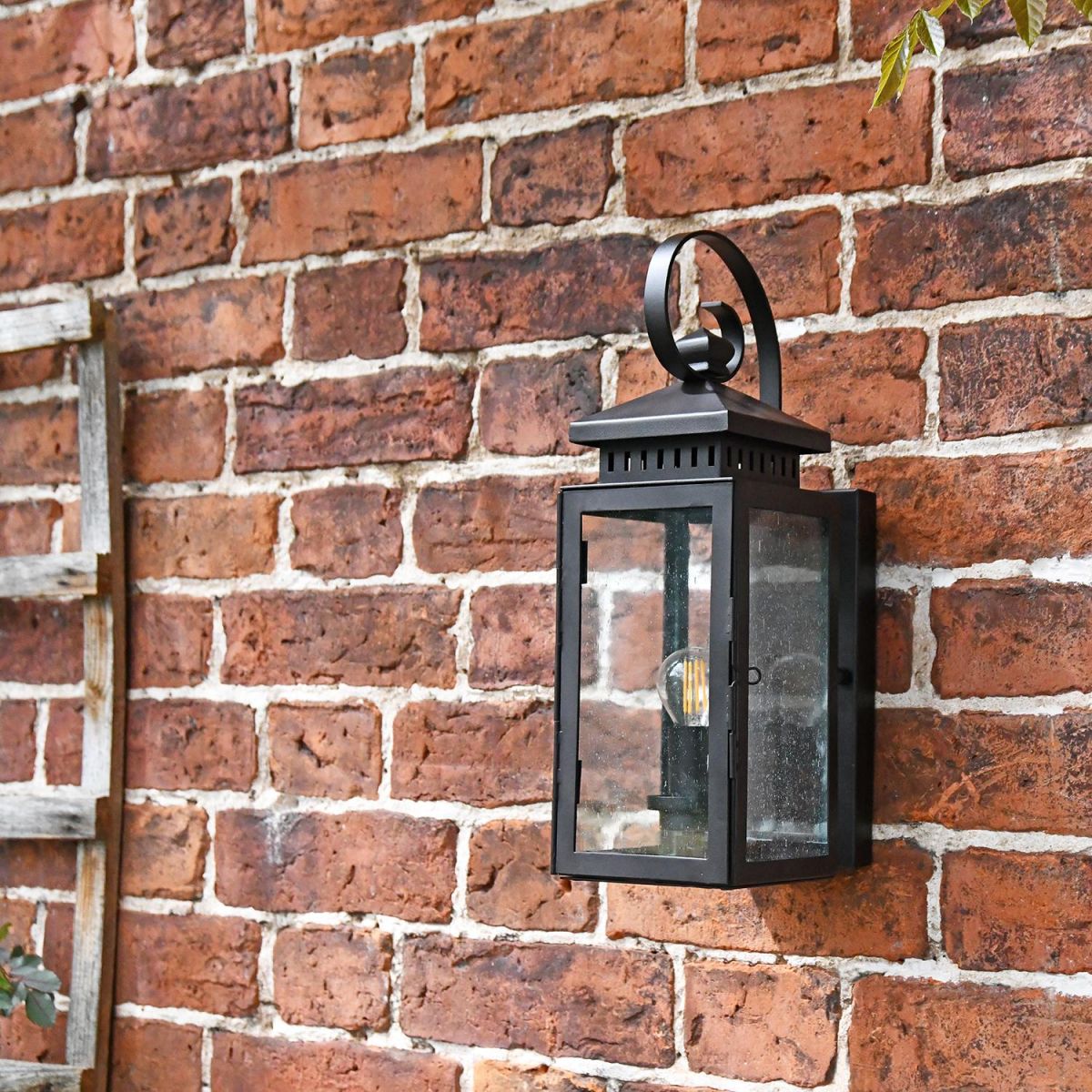 Traditional Flush Coastal Wall Lantern on a Brick Wall on a House 