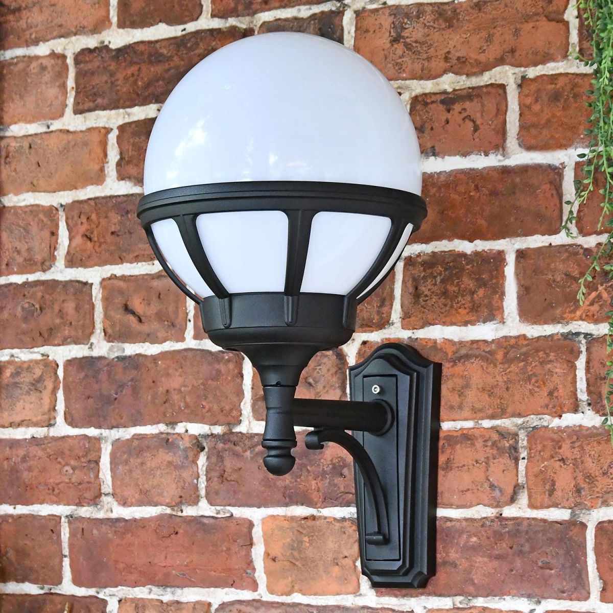 Traditional Globe Outside Wall Light in Situ on a Brick Wall