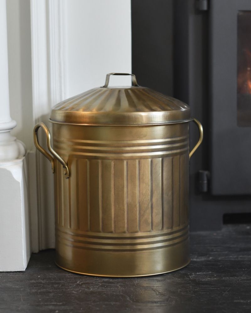 Traditional Gold Log Bucket Near The Fire Traditional Gold Log Bucket Near The Fire