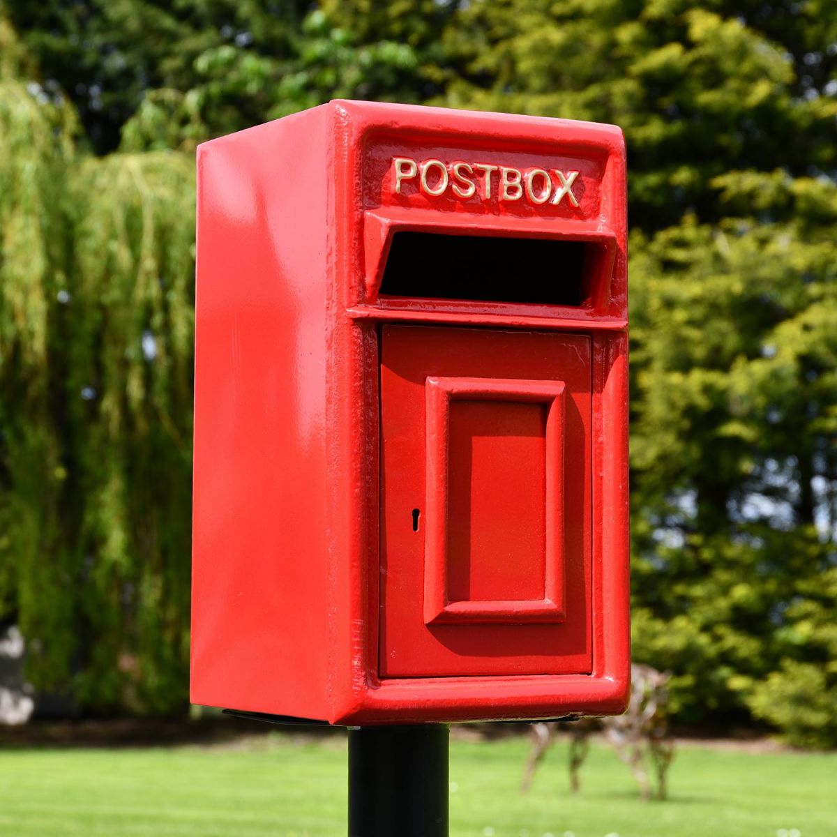 Close-up of the Traditional Red & Gold Post Box