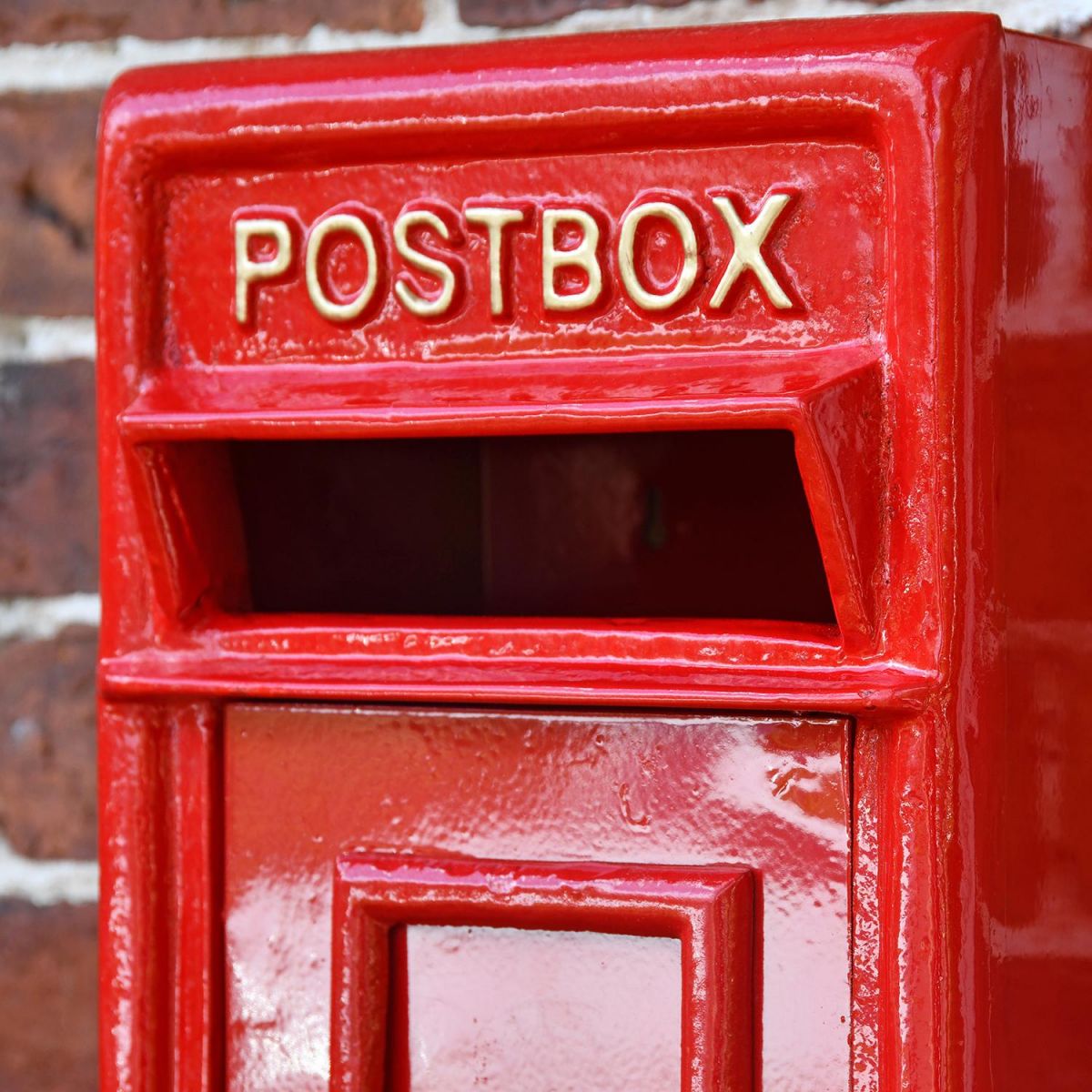 Close-up of the Red Text on the Front of the Post box