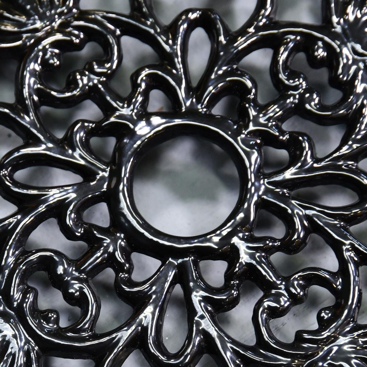 Ornate Design on the Black Heavy Duty Cast Iron Round Trivet
