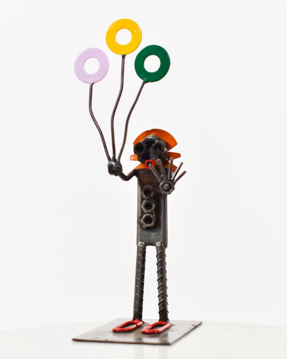 Tuppence the Clown Upcycled Metal Ornament angled view of full ornament