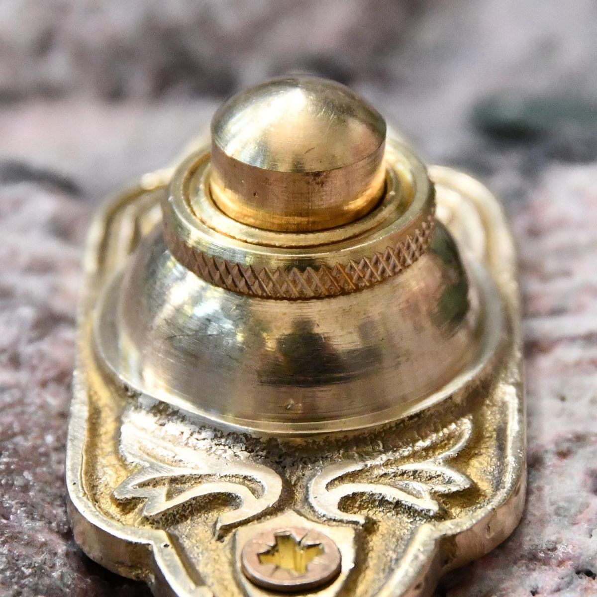 Close up of doorbell nib  Close up of doorbell nib
