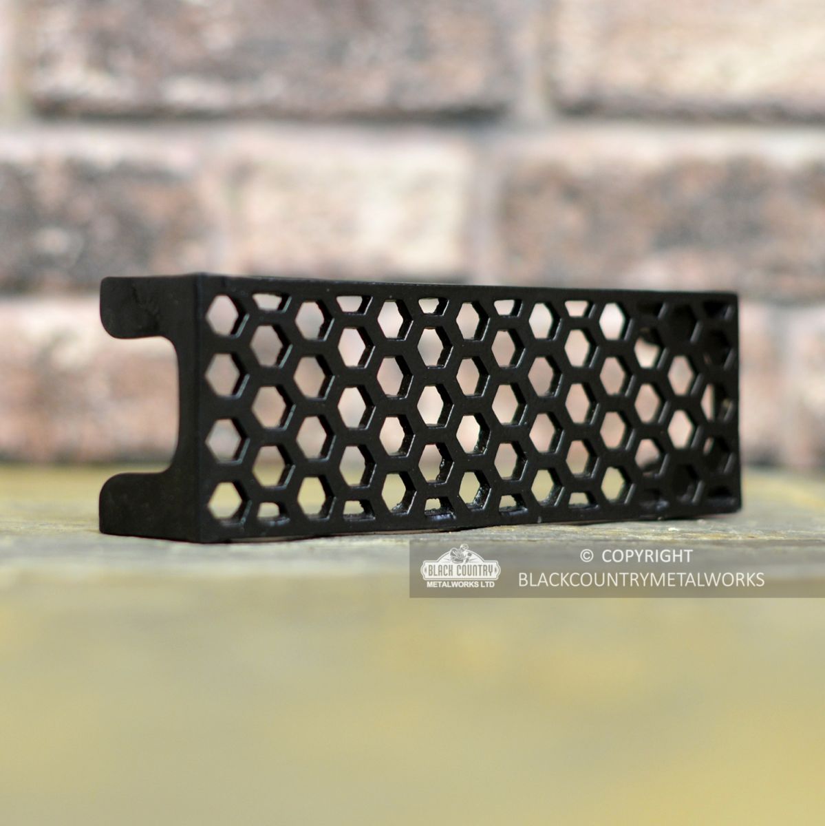 View of the Side of the "Honeycomb" Cast Iron Air Brick