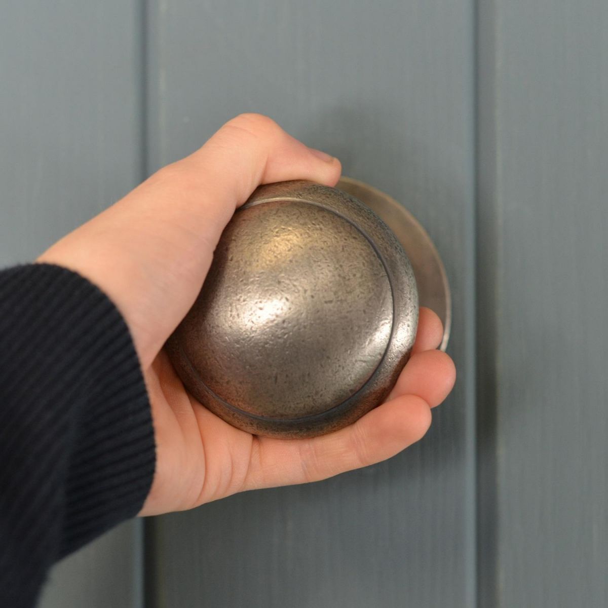 Smooth Antique Pewter Door Handle with Hand for scale Smooth Antique Pewter Door Handle with Hand for scale