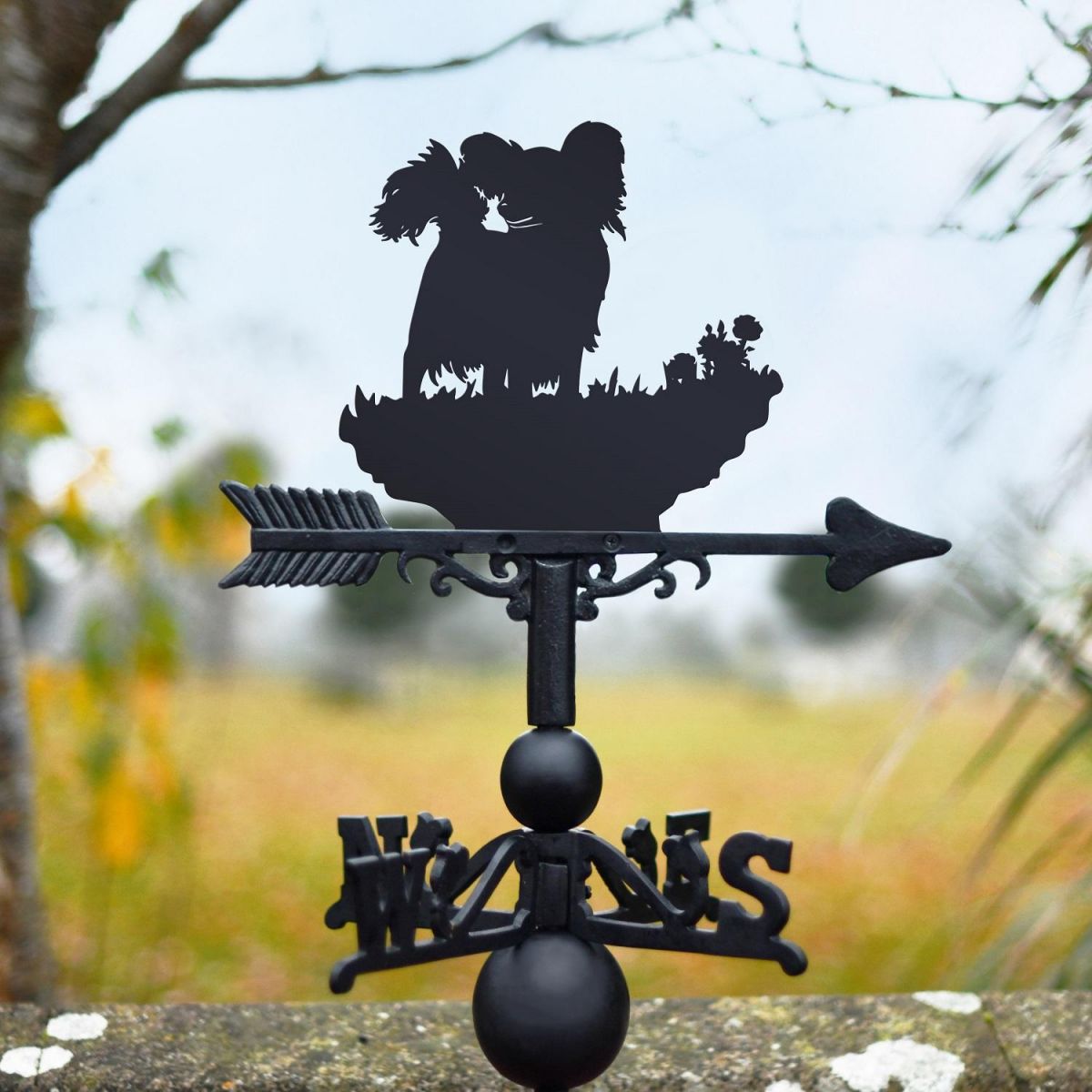"Papillon" Dog Weathervane in Garden Setting "Papillon" Dog Weathervane in Garden Setting