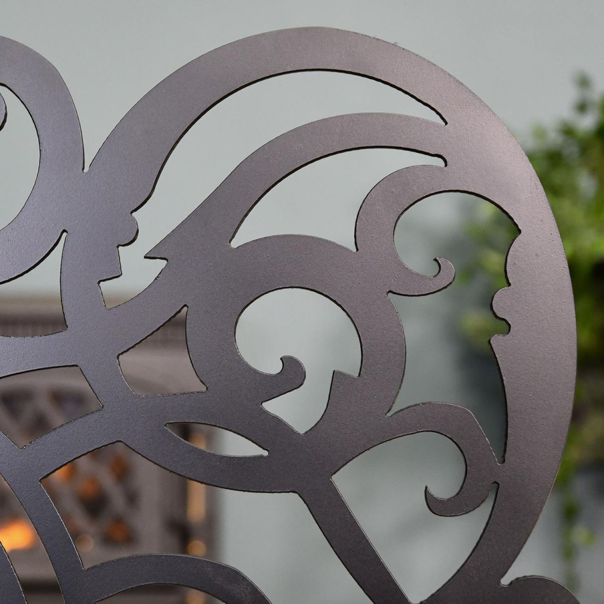 Ornate Design on the Monogram Fireguard