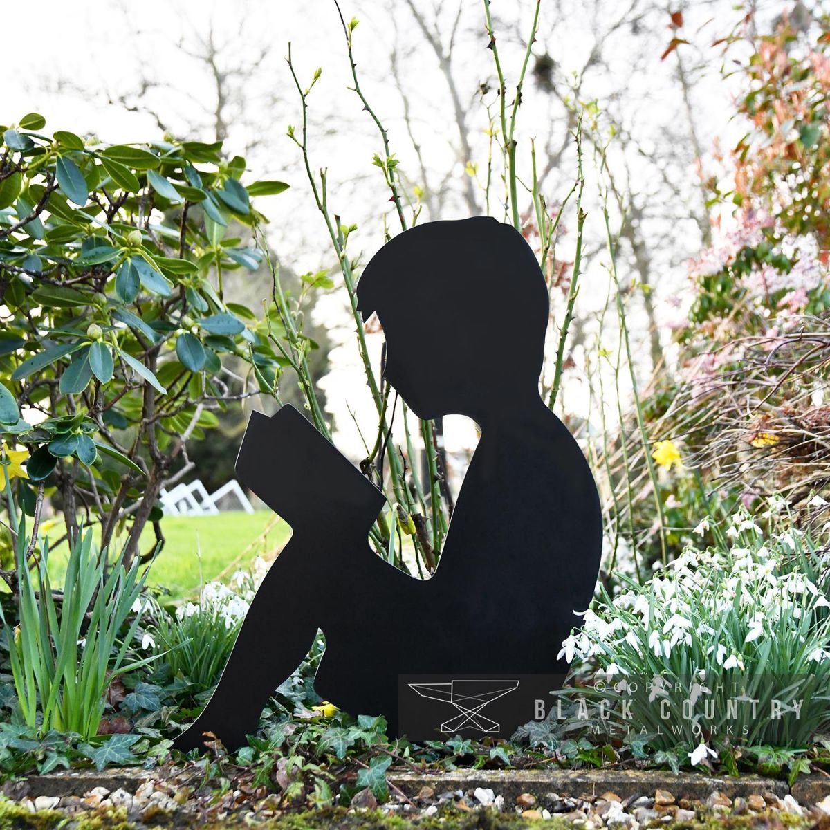 Boy Reading Silhouette Finished in Black