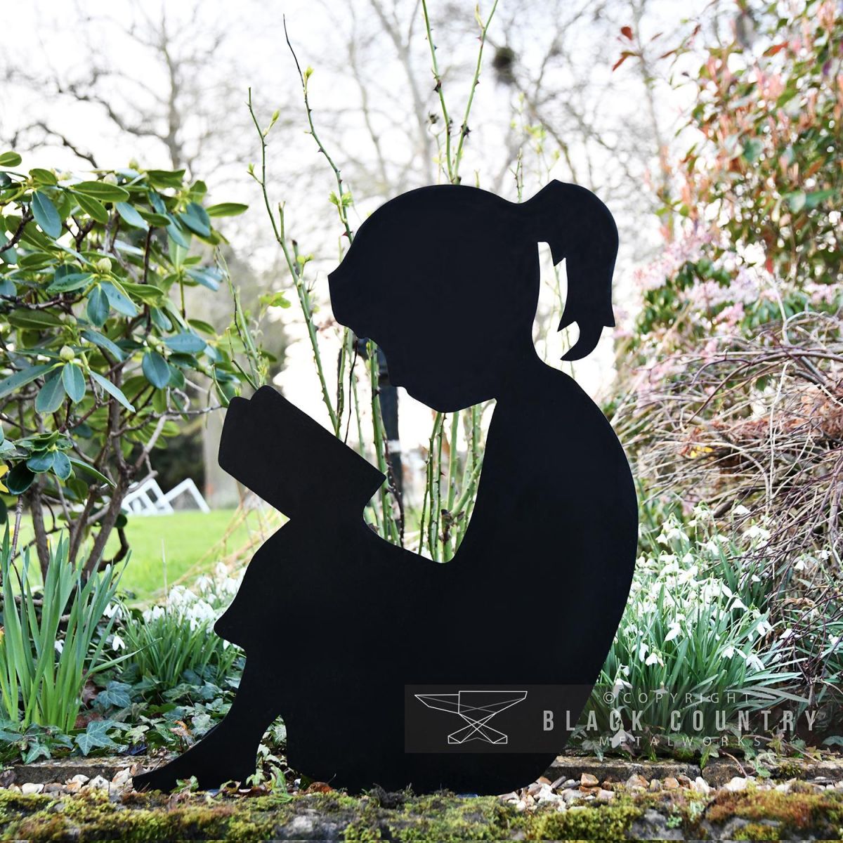 Girl Reading Silhouette Finished in Black