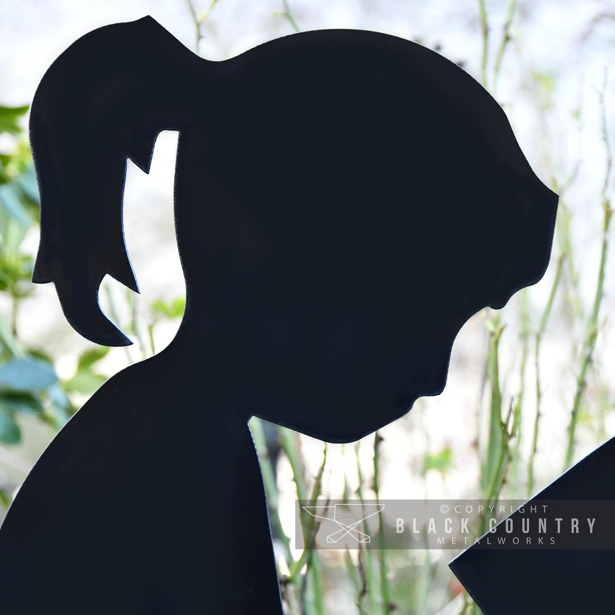 Close-up of the Face of the Girl Reading Silhouette