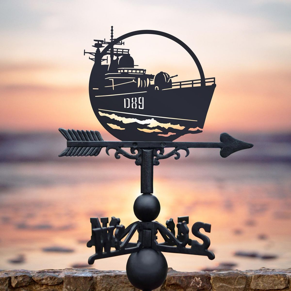 HMS Exeter Weathervane by the Sunset