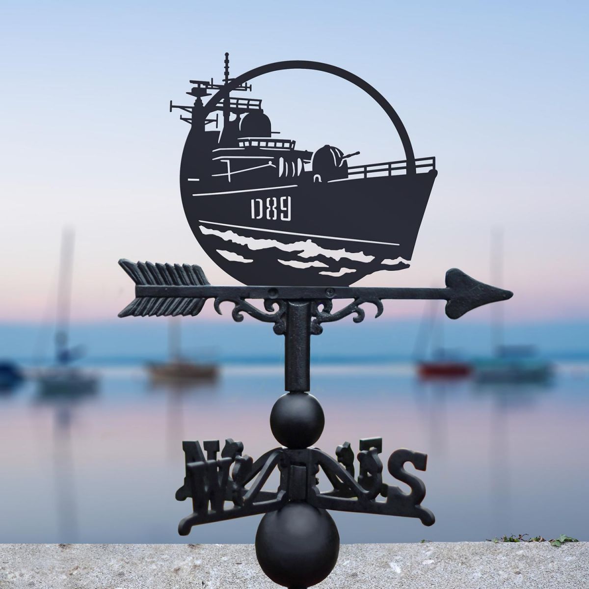 HMS Exeter Weathervane in Situ by a Boat Dock