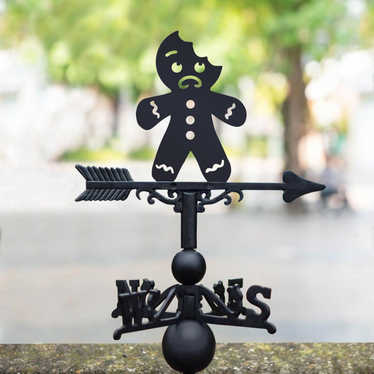 Weathervane with Bitten Gingerbread Man Motif