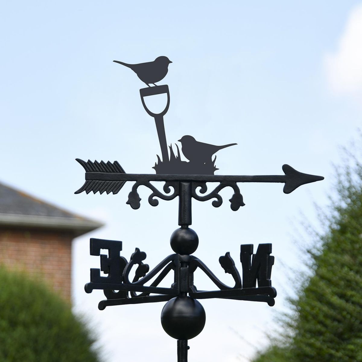 Close-up of the Pair of Robins Topper on the Weathervane Close-up of the Pair of Robins Topper on the Weathervane