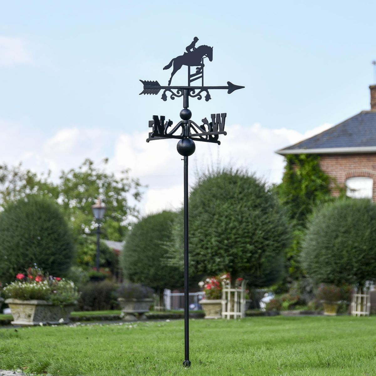 Show Jumping Horse Free Standing Weathervane in Use in the Garden