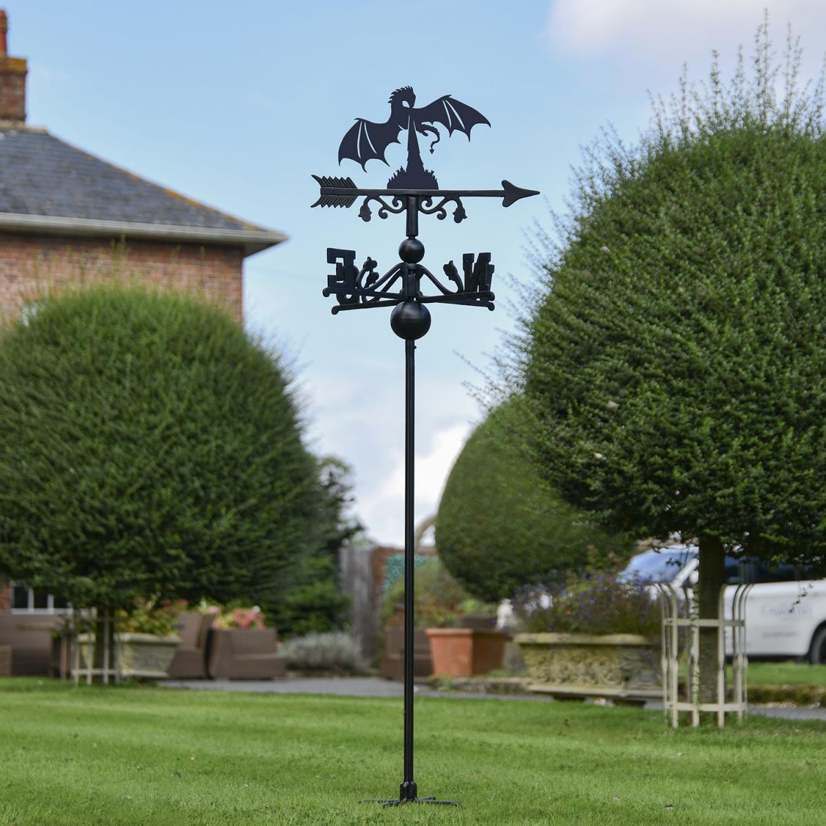 Fire Breathing Dragon Free Standing Weathervane in Use in the Garden