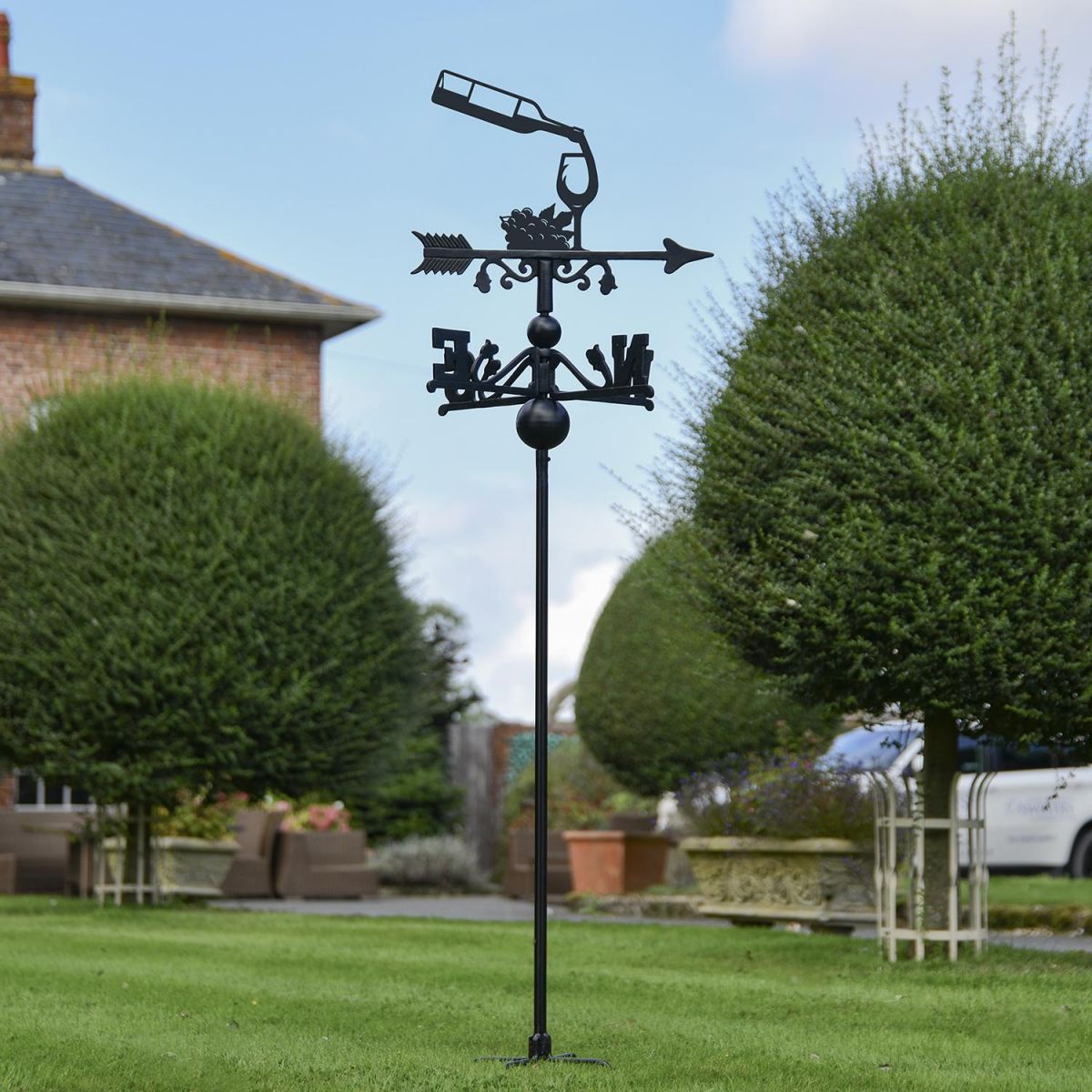 Wine Bottle & Glass Free Standing Weathervane in Use in the Garden Wine Bottle & Glass Free Standing Weathervane in Use in the Garden