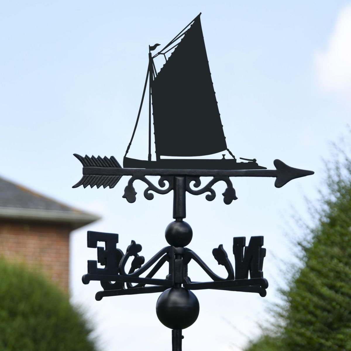Close-Up of Norfolk Wherry Sail Boat Topper on Free Standing Weathervane to Scale Close-Up of Norfolk Wherry Sail Boat Topper on Free Standing Weathervane to Scale