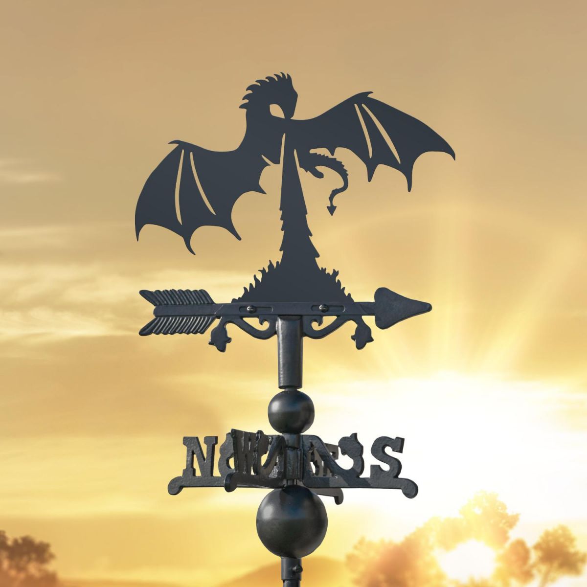 Dragon Fire on Miniature Weathervane at Sunset