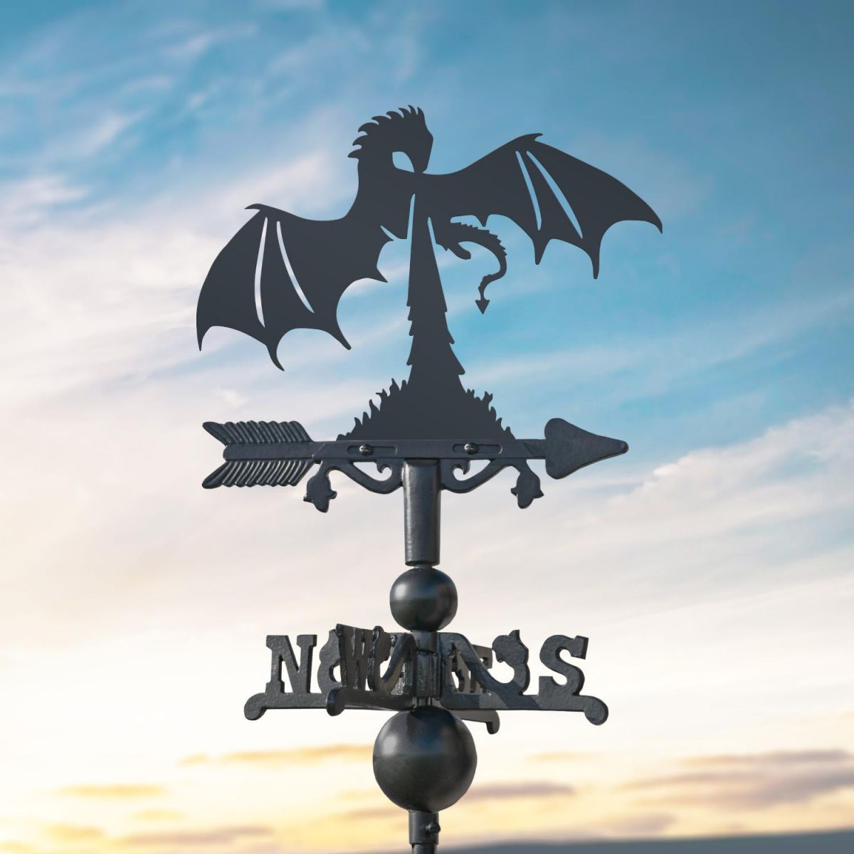 Dragon Fire on Miniature Weathervane at Dusk