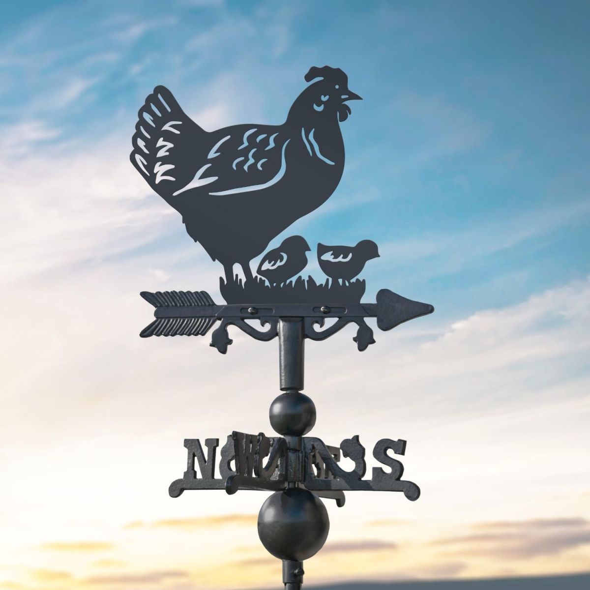 Hen & Chicks on Miniature Weathervane at Dusk