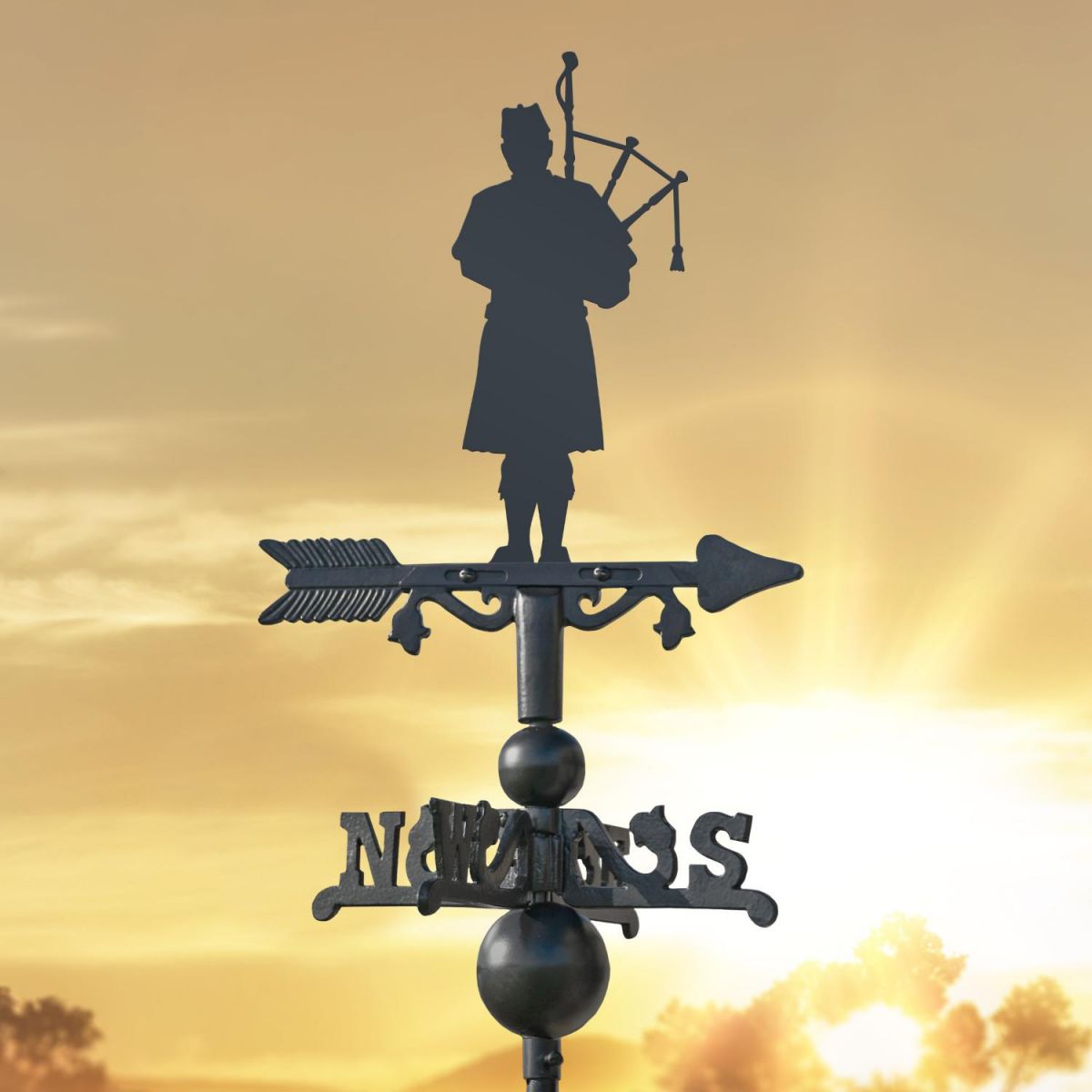 Scottish Bagpiper on Miniature Weathervane at Sunset
