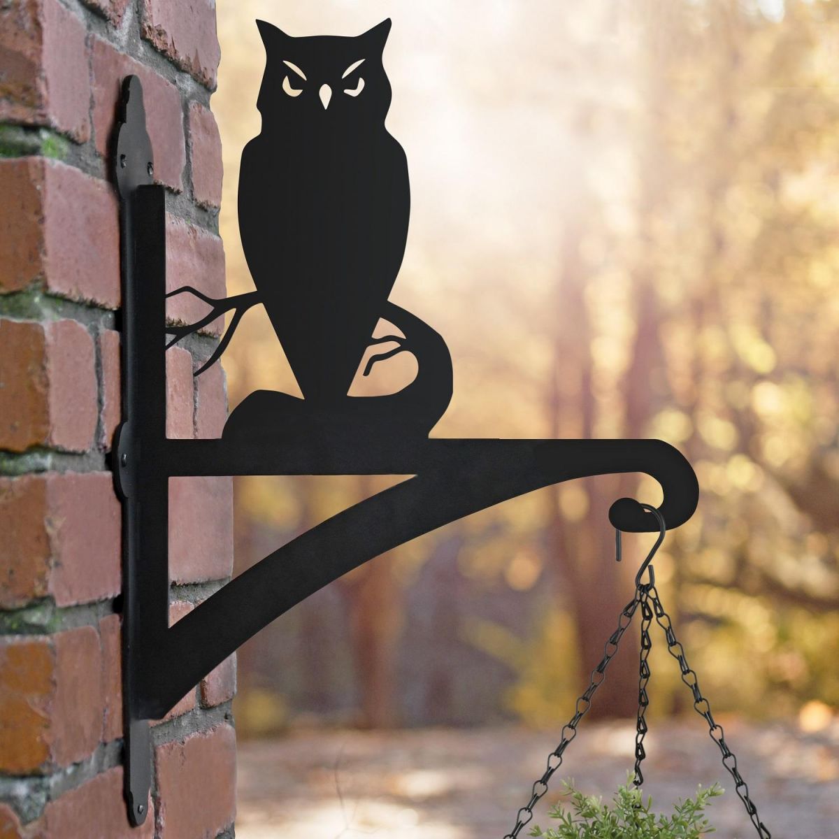 Owl Hanging Basket Bracket in Situ on a Brick Wall