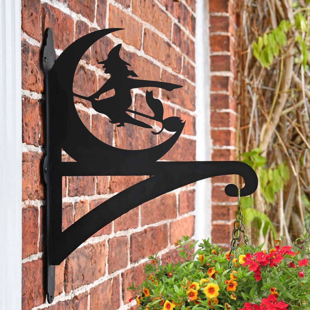 Witch Hanging Basket Bracket in Situ on a Brick Wall