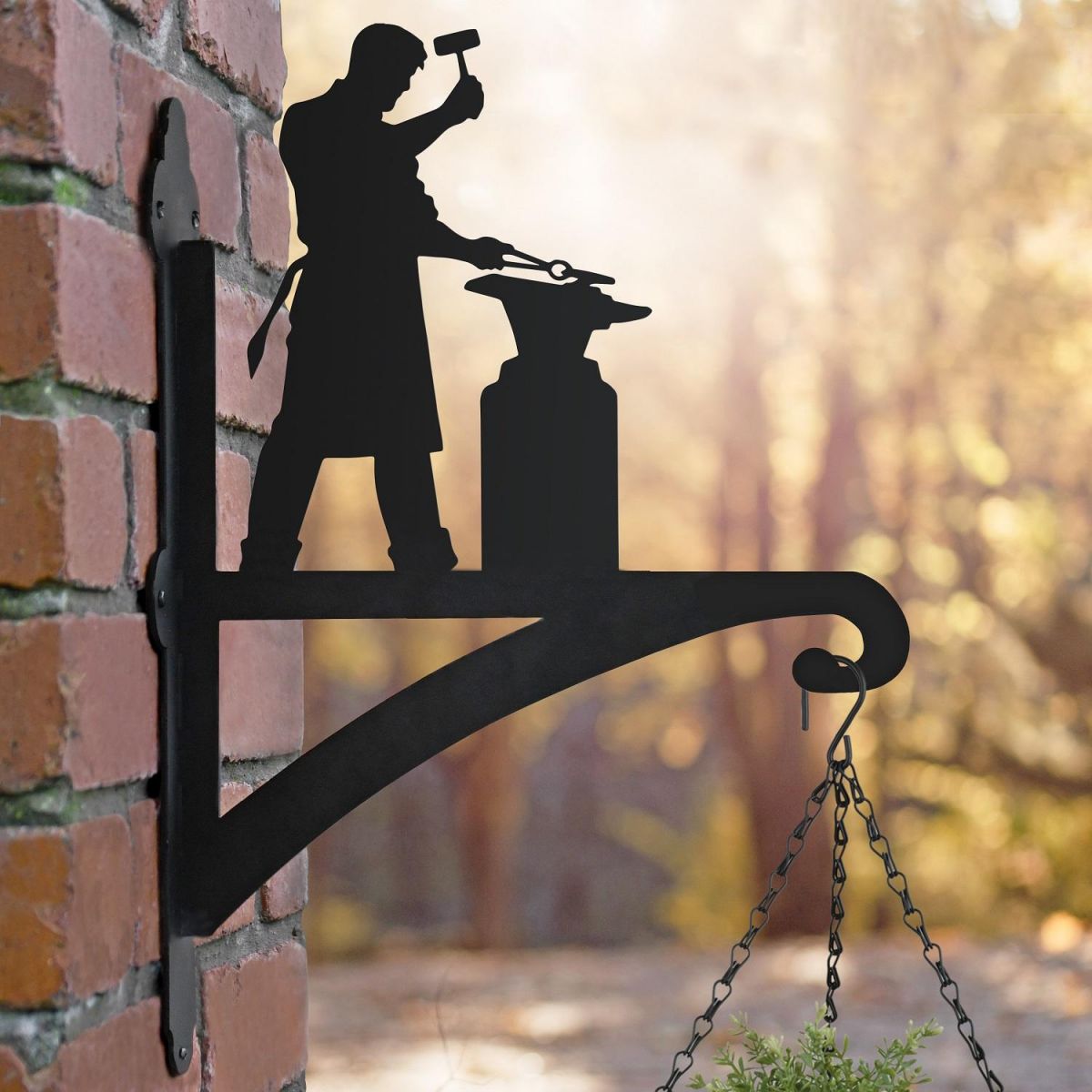 Blacksmith Hanging Basket Bracket in Situ on a Brick Wall Blacksmith Hanging Basket Bracket in Situ on a Brick Wall