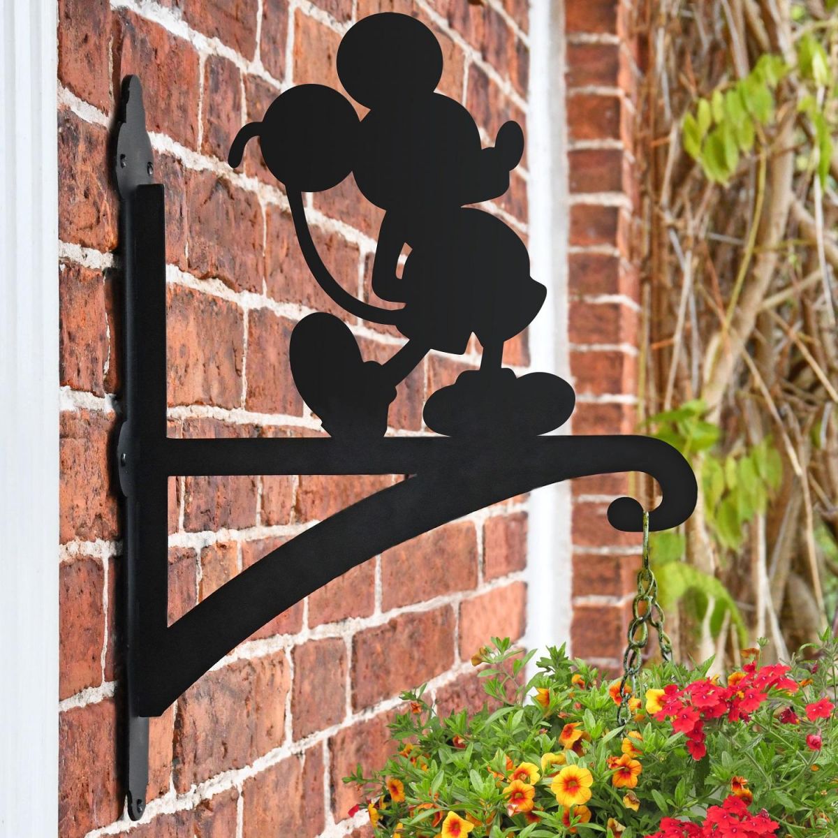 Mouse Design on Garden Hanging Basket Bracket in Situ on a Brick Wall Mouse Design on Garden Hanging Basket Bracket in Situ on a Brick Wall