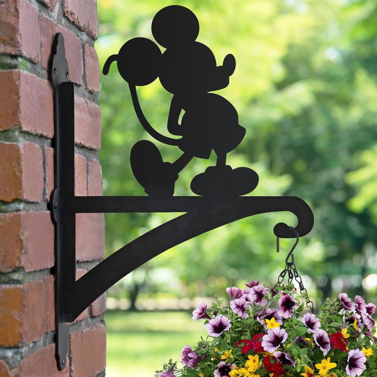 Mouse Hanging Basket Bracket on a Brick Wall in the Garden Mouse Hanging Basket Bracket on a Brick Wall in the Garden