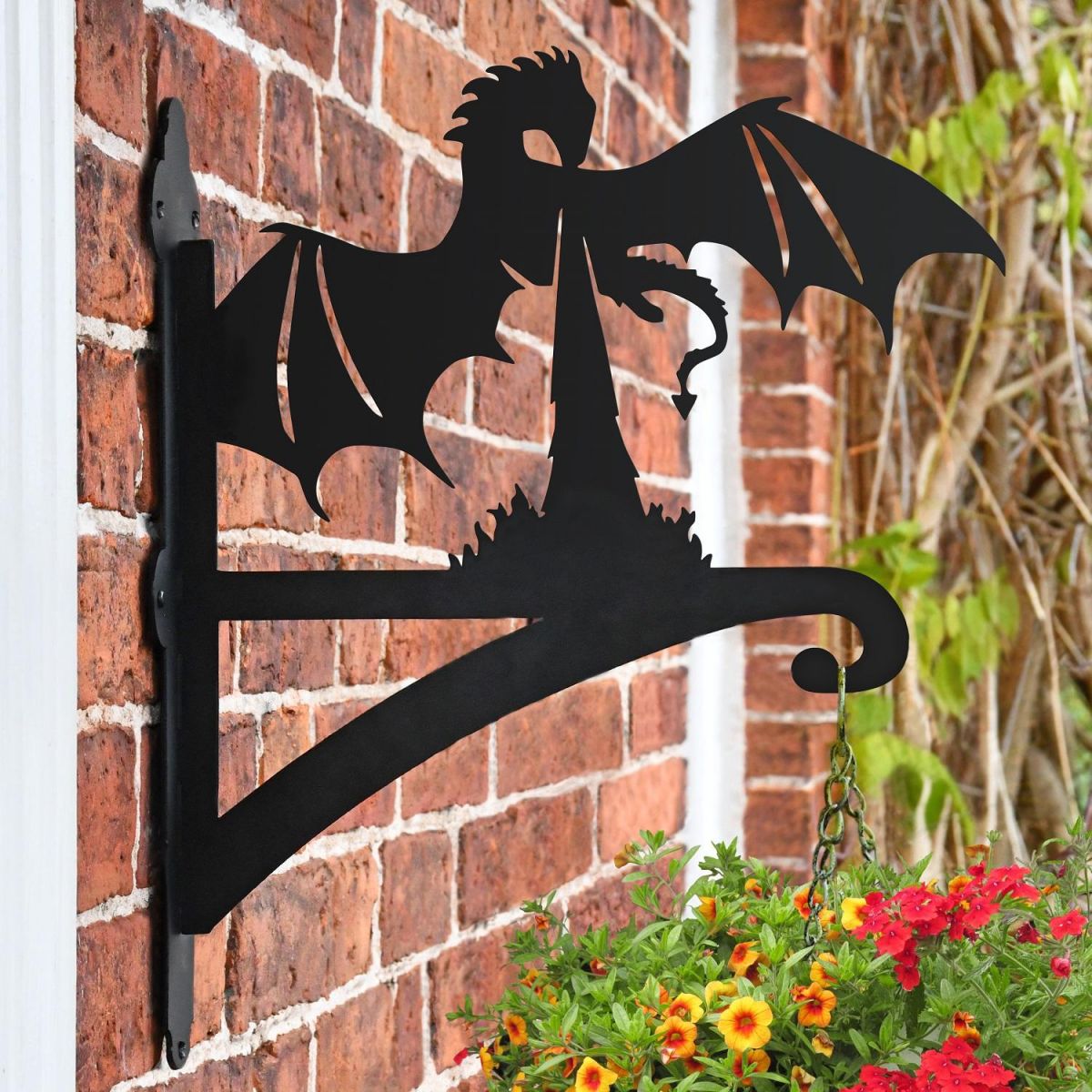 Dragon Breathing Fire Hanging Basket Bracket in Situ on a Brick Wall