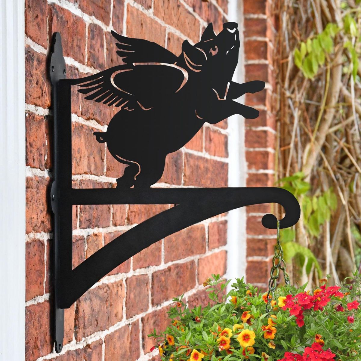 Flying Pig Hanging Basket Bracket in Situ on a Brick Wall