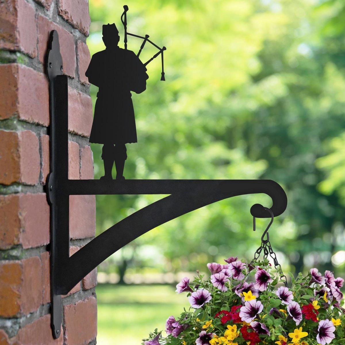 Scottish Bagpiper Hanging Basket Bracket Mounted onto a Brick Wall  Scottish Bagpiper Hanging Basket Bracket Mounted onto a Brick Wall