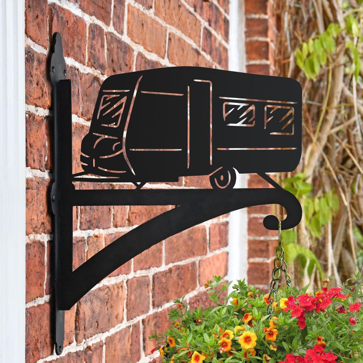 Caravan Iron Hanging Basket Bracket on Brick Wall  Caravan Iron Hanging Basket Bracket on Brick Wall