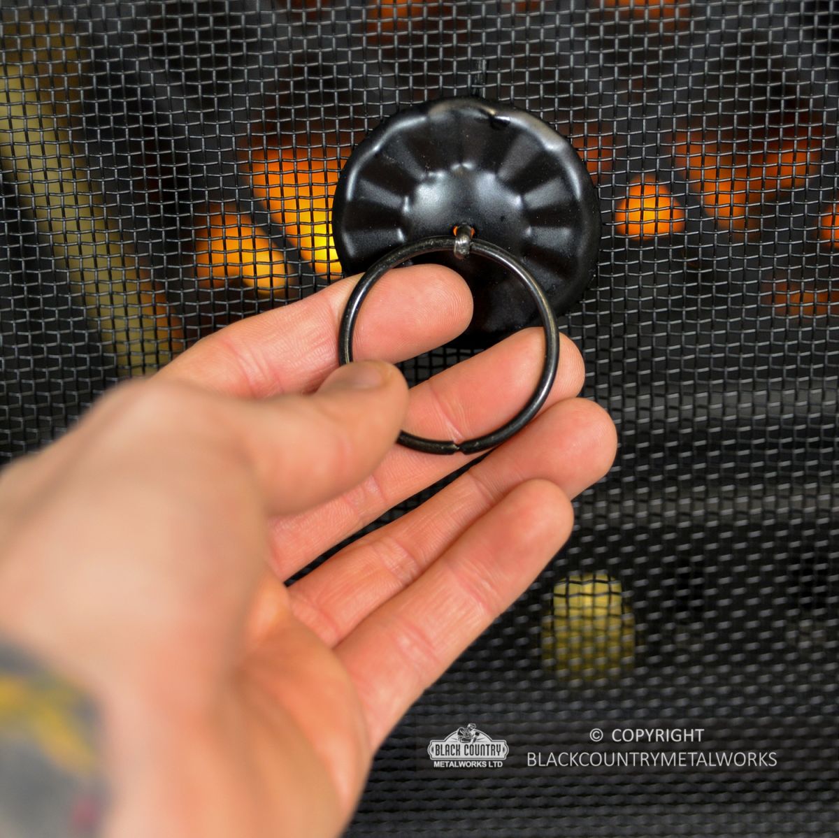 Decorative Handle on the Front of the Fire Guard to Scale