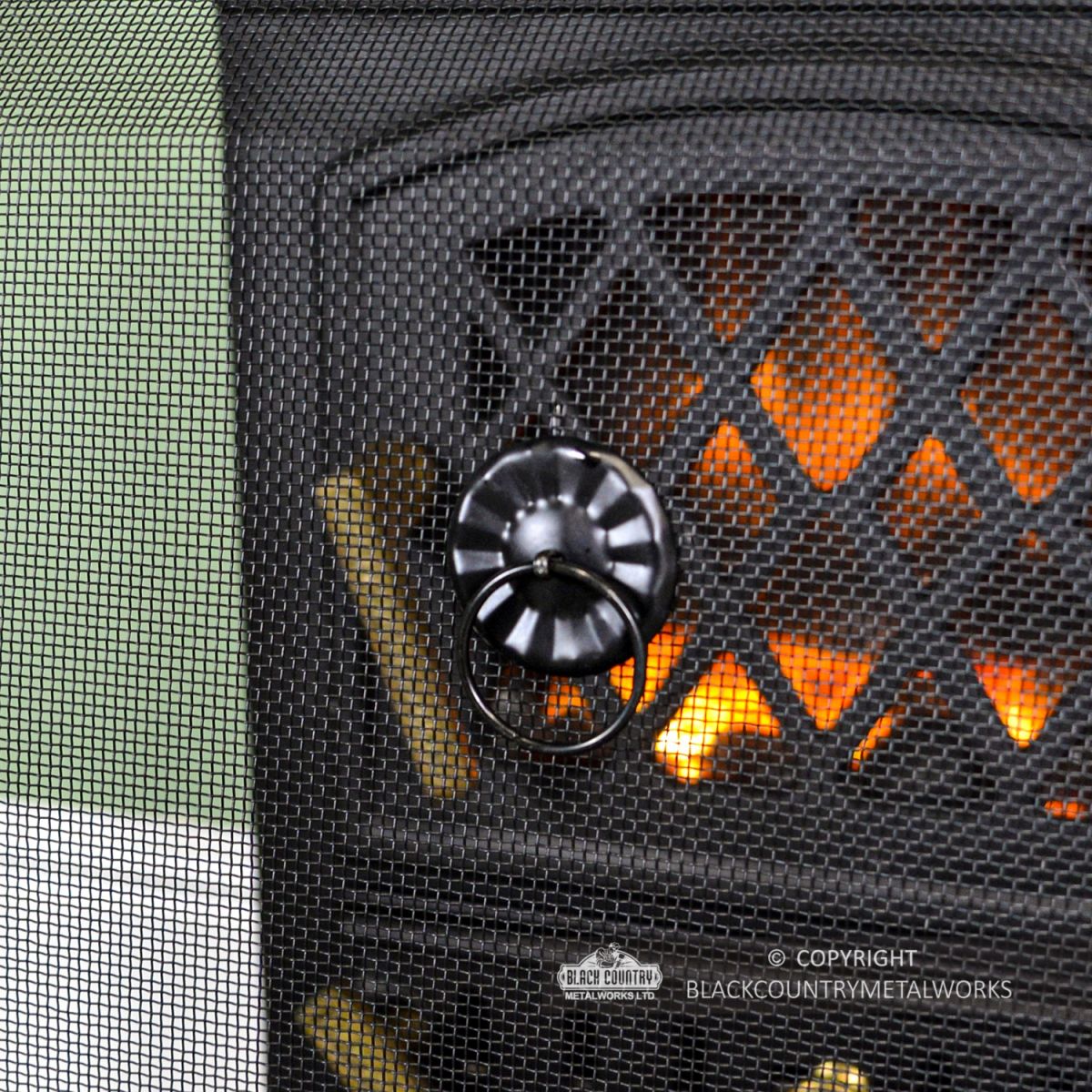 Decorative Handle on the Front of the Fire Guard