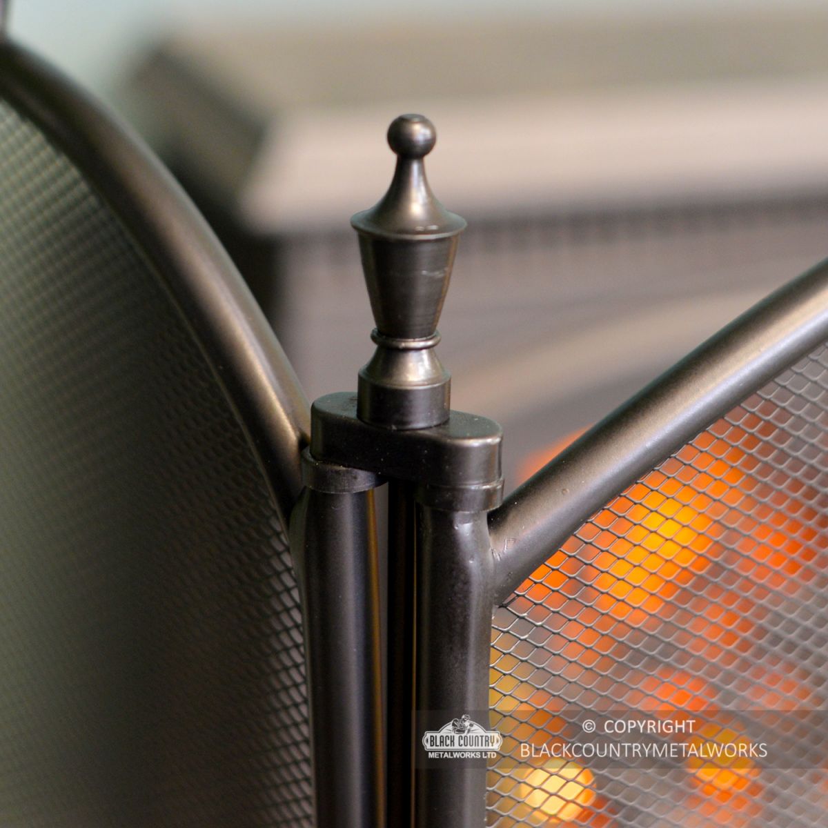 Urn Style Finials on the Top of the Fireguard