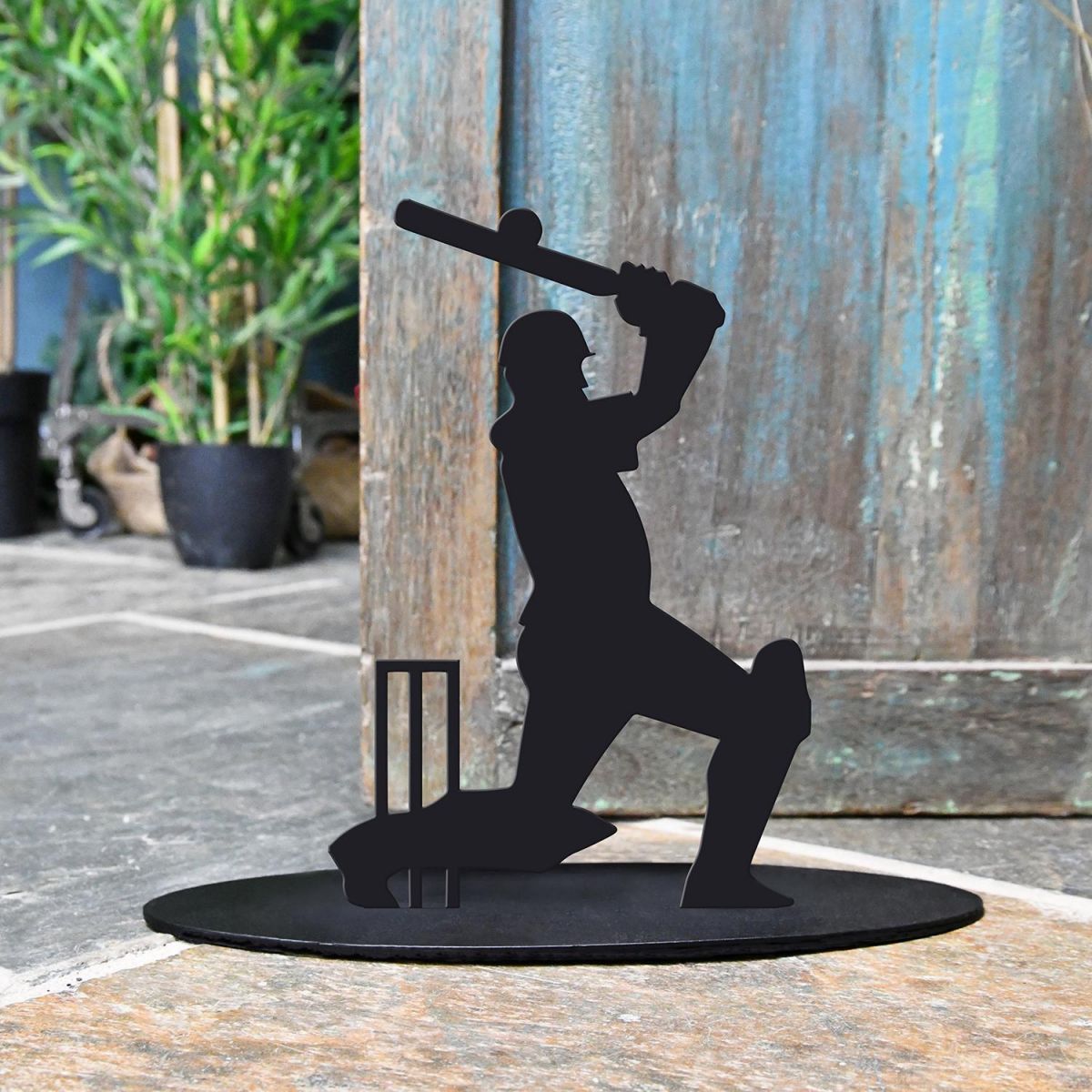 Cricket Player Iron Door Stop in Black