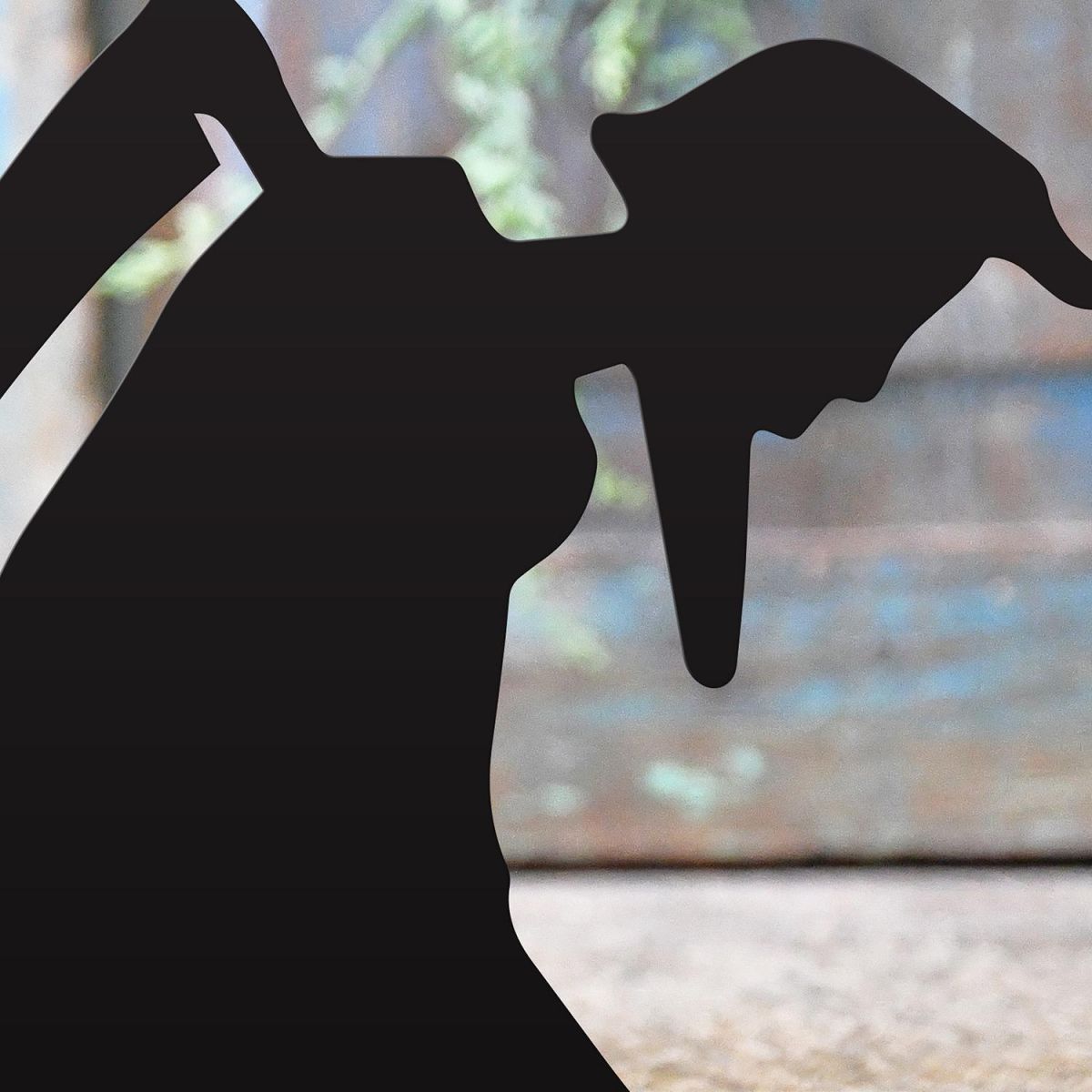 Close-up of the Black Finish on the Old Father Time Iron Door Stop Close-up of the Black Finish on the Old Father Time Iron Door Stop