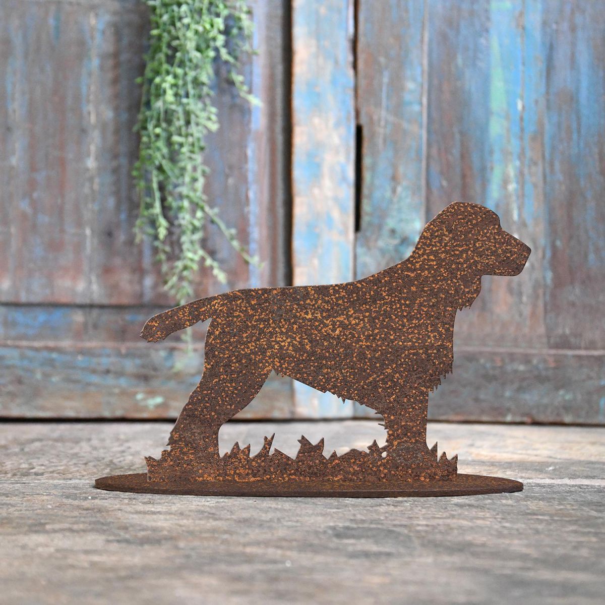 Cocker Spaniel Rustic Iron Door Stop in Front of a Rustic Blue Door Cocker Spaniel Rustic Iron Door Stop in Front of a Rustic Blue Door