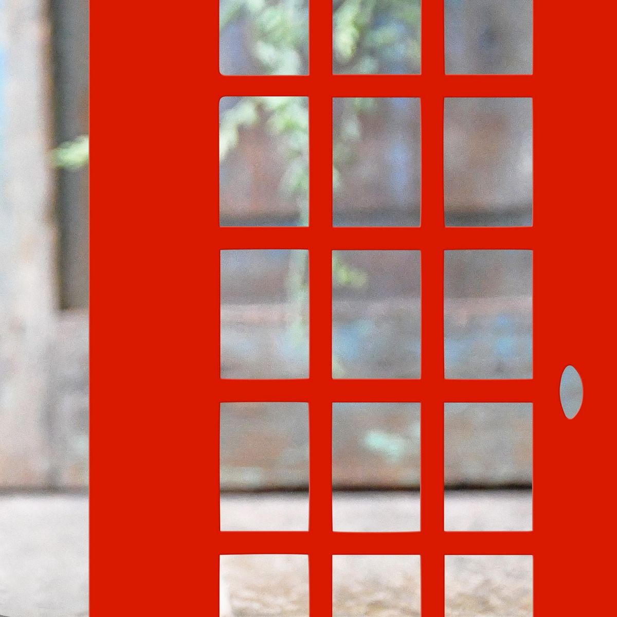 Close-up of the Finish on the Red Telephone Box Iron Door Stop